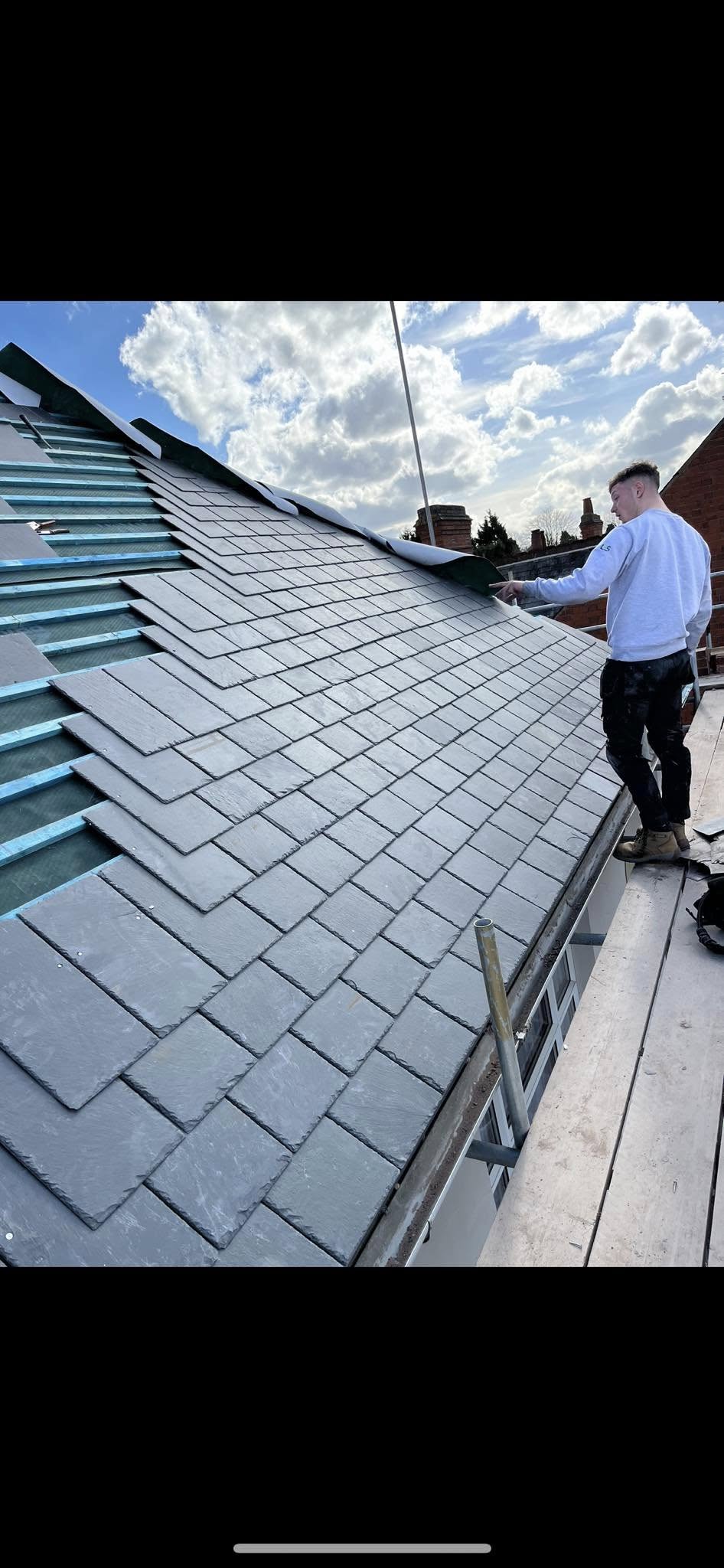 New slate roof installation